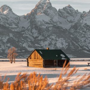 Log cabin in the snow