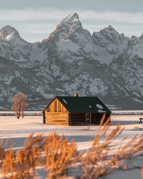 Log cabin in the snow